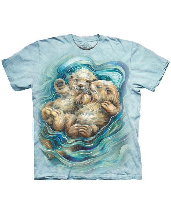 A blue crewneck T-shirt with a graphic of two cuddling otters surrounded by water. The background is plain white.