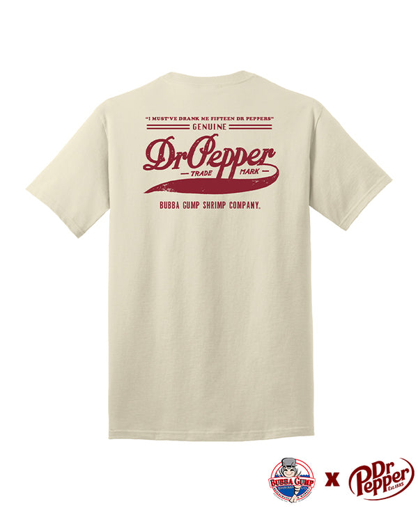 The back of a beige crewneck T-shirt featuring red text that reads "I MUST'VE DRANK ME FIFTEEN DR PEPPERS" followed by "GENUINE Dr Pepper TRADEMARK BUBBA GUMP SHRIMP COMPANY." The background is white, and at the bottom right corner there are logos for Bubba Gump Shrimp Co. and Dr Pepper.