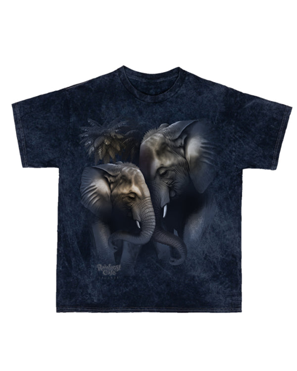 A navy slightly marbled crewneck T-shirt with a design in the center of two elephants touching heads behind a palm tree, with the "RAINFOREST CAFE" logo under it. The background is white.