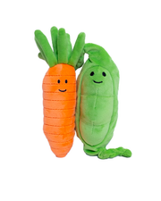 Two connected plush toys standing side by side designed as a carrot and a pea pod with smiley faces. The background is plain white.