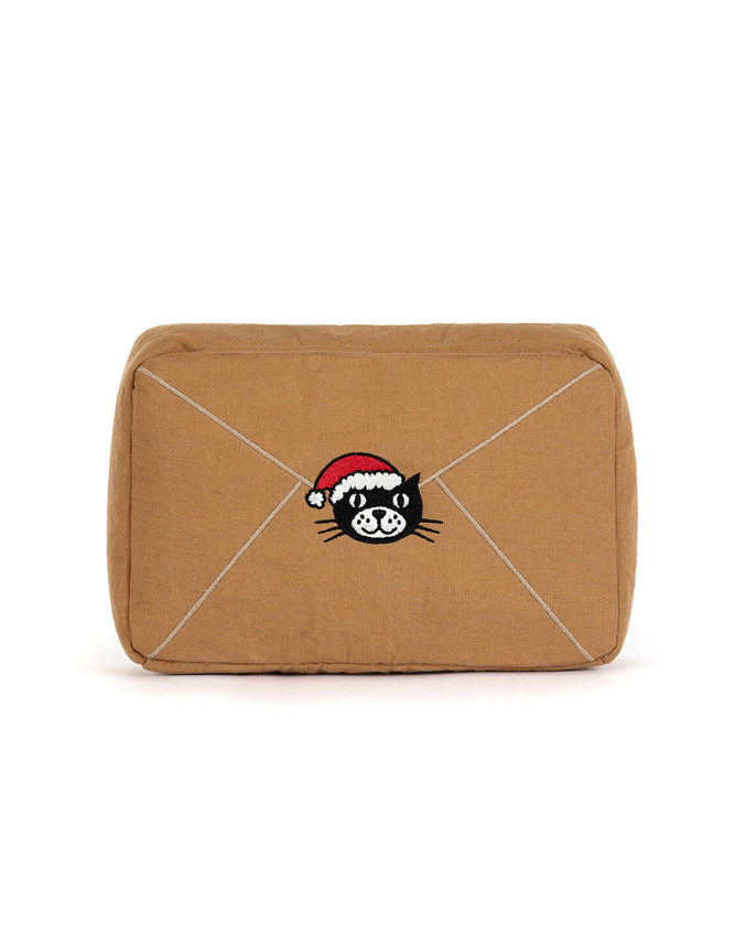 Brown envelope back view with a stamp of cat wearing a Santa hat design on a white background
