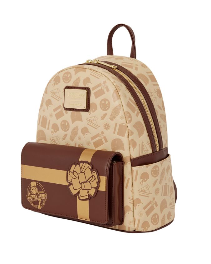 A Loungefly  X Bubba Gump mini backpack in beige and brown, featuring a patterned body, a front zip pocket with a chocolate box design, and a top handle, shown on a plain white background.