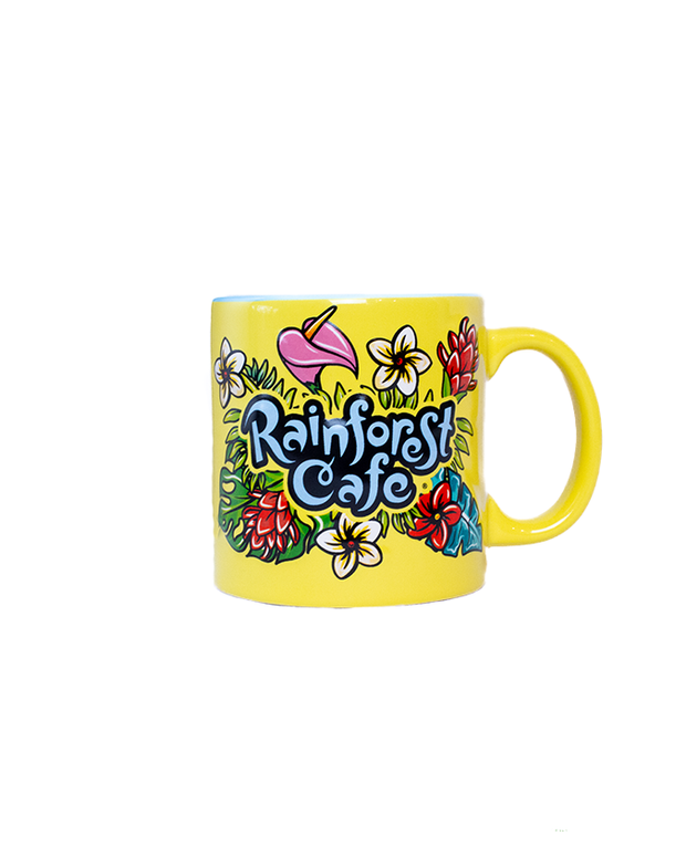 Yellow mug with colorful floral designs and 'Rainforest Cafe' text on a white background