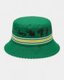 A green bucket hat featuring black silhouettes of various animals around a white and yellow striped band, set against a plain light gray background.