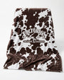 Saltgrass | Classic Logo Cowhide Print | Plush Blanket