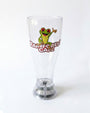 A clear plastic pint glass featuring a green tree frog graphic and the words 'RAINFOREST CAPE' in red and yellow, set against a plain white background.