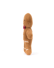 Side view stuffed gingerbread man toy on a white background