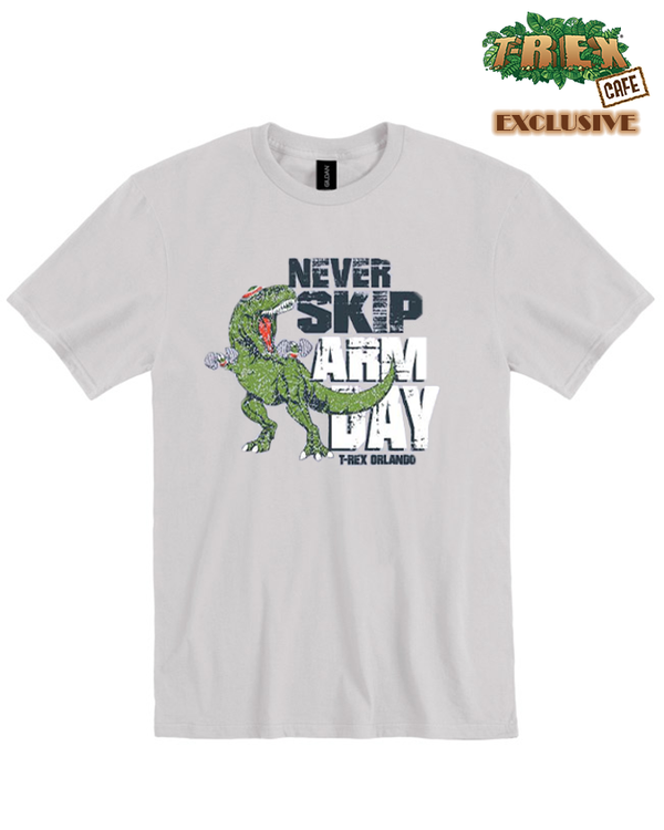 A grey crewneck T-shirt featuring a graphic of a T-Rex with the text ‘NEVER SKIP ARM DAY’ and "T-REX ORLANDO" under it. The background is plain white and features a rainbow ‘30 WILD YEARS!’ logo featuring CHA! CHA!