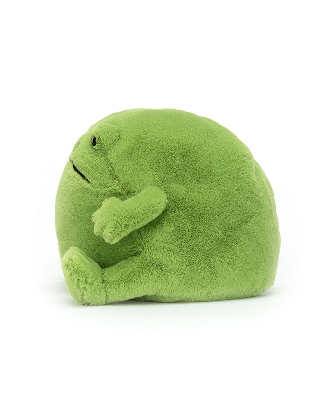 A sideview of a round green plush frog with a slightly frowning expression, sitting against a white background.