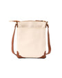 Back view. Cream-colored crossbody bag with a brown bottom corner and strap. The bag features a gold zipper , front pocket and a distinctive gold embellishments.