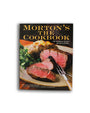 A cookbook titled "Morton's The Cookbook", "100 Steakhouse Recipes for Every Kitchen" by Klaus Fritsch and Tylor Fields with Mary Goodbody. The cover features an image of a sliced steak, and a baked potato. The background is plain white.
