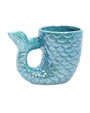 Ceramic teal mug shaped like a mermaid's tail with detailed scales and tailfin.